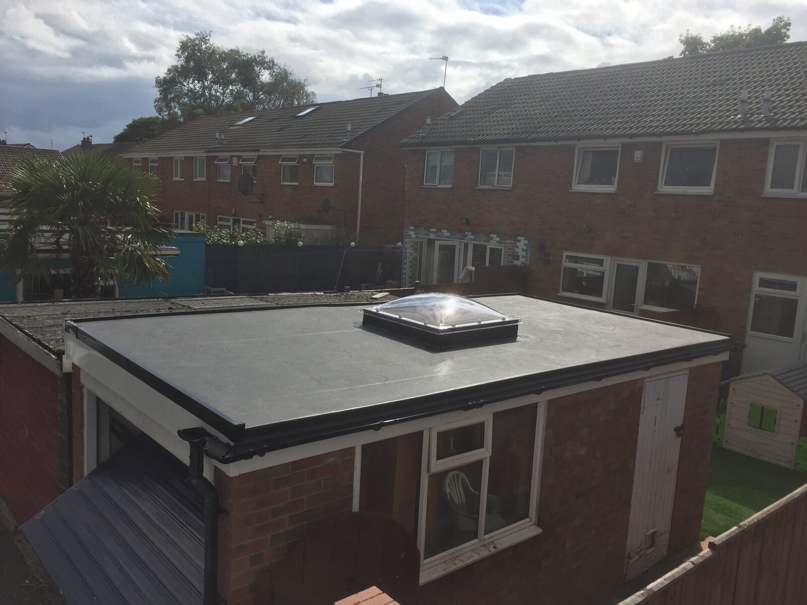 Rubber flat roof with skylight on a UK property